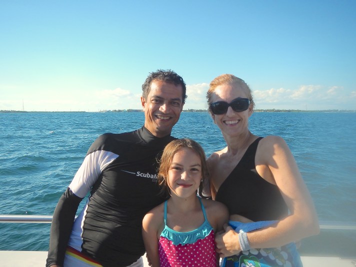 The author and her family enjoying a boat ride while snorkeling in The Florida Keys.