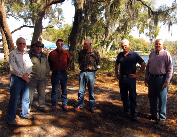 Bob Lee (left) with game wardens from the book