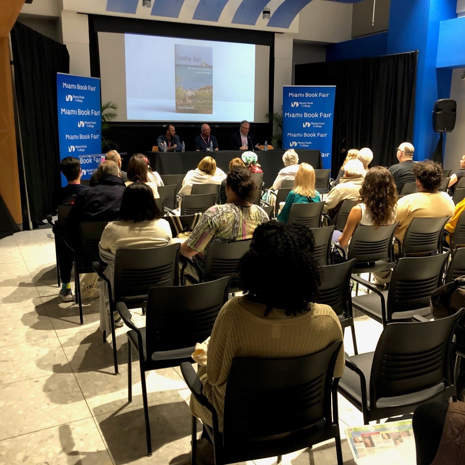 Evan P. Bennett, author of Tampa Bay, presenting alongside Ian Wilson-Navarro, author of Dry Tortugas, and Christopher F. Meindl, author of Florida Springs, on a panel titled protecting Florida's Parks and Ecosystems at the Miami Book Fair.