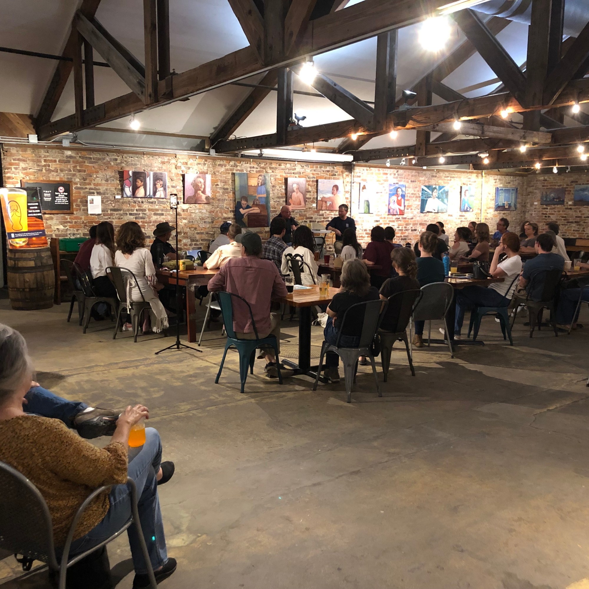 Attendees at an event for Christopher Meindl, author of Florida Springs, presented at Cypress & Grove Brewing Co.